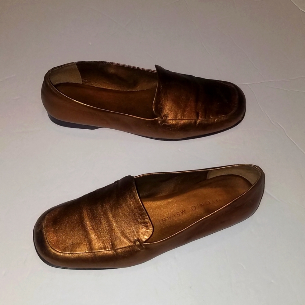 Antonio Melani gold leather loafers.